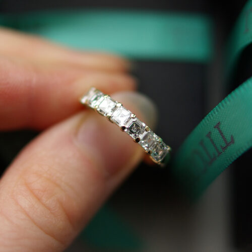 Seven Assher Cut Diamond Eternity Ring