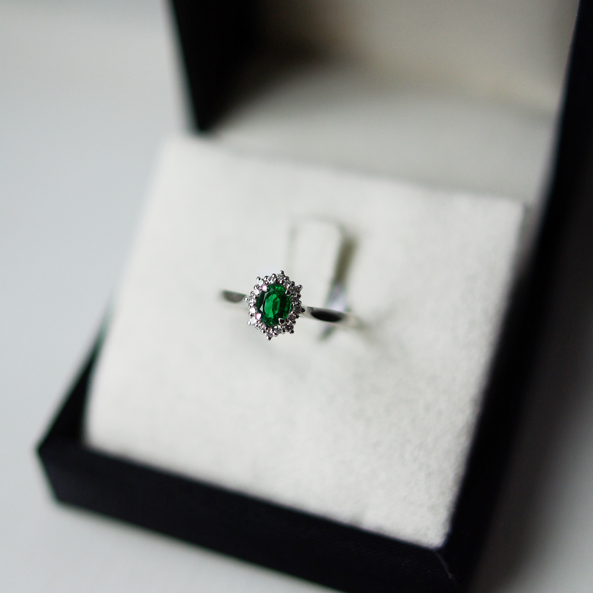 Oval Emerald Cut With Diamond Halo Ring