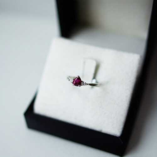 Pear Cut Ruby And Pear Diamond Outers Trilogy Ring